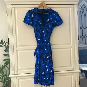 Banana republic wrap dress with blue and black floral detailing.